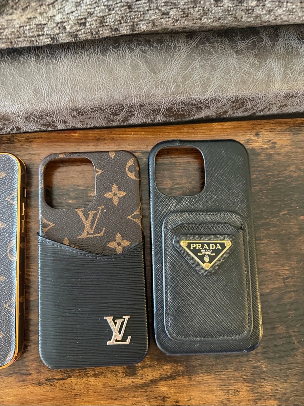 5 - iPhone 14 Pro Max cases. The brown one to the left is a flaunt case.